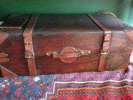 One wood and leather suitcase
