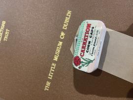 Carnation Corn Caps tin
