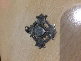 1923 Silver Medal for 'Dumbells'- awarded by Loreto College, the Green